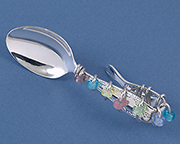bent handle silver spoon with beads